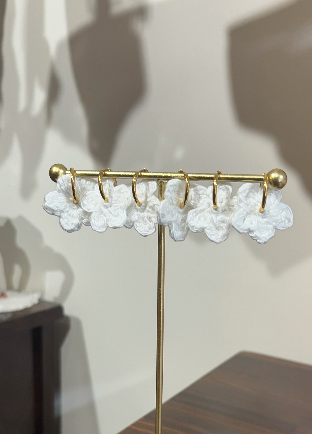 La boucle d'oreille Napperon